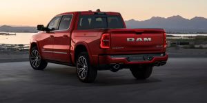 Red 2026 RAM 1500 Stopped by a scenery, Back profile