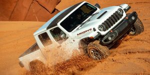2026 White Jeep Gladiator roaring on sands 