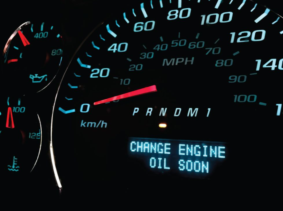 Oil change notification on a cars dashboard.