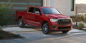 New 2026 RAM 1500 Parked in front of Garage