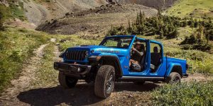 2026 Blue Jeep Gladiator Climbing Hills
